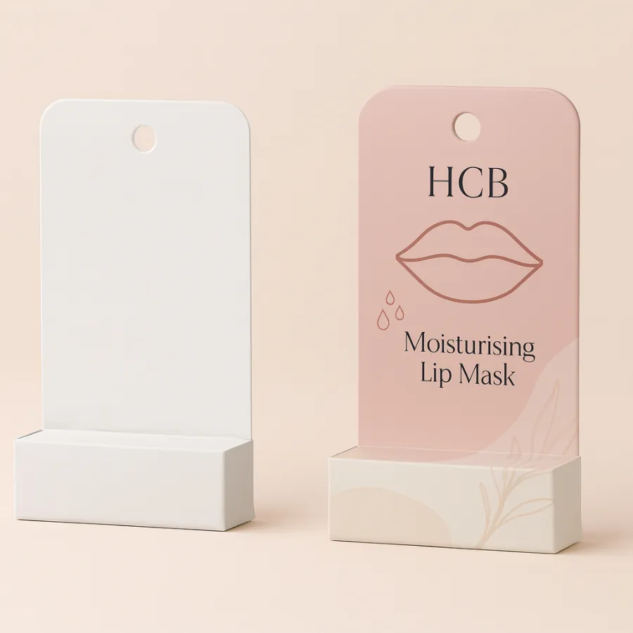 Two hanging display boxes- one plain white and one pink with a lip illustration- class=